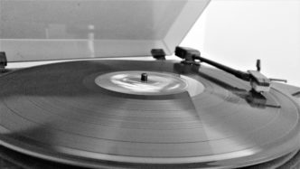 a St. Paul record spins on a home turntable